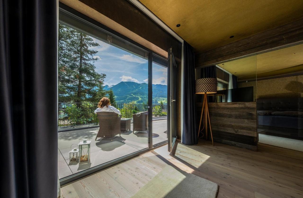 La Roccia Wellness Hotel Cavalese Bagian luar foto
