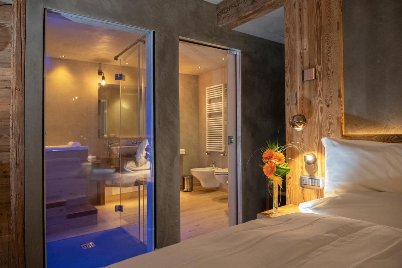 La Roccia Wellness Hotel Cavalese Bagian luar foto